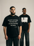 Akhlaq Over Beauty black tee, studio duo