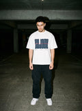 Sujood for the Heart white tee, garage flash